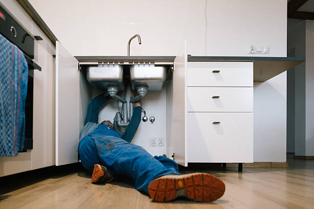 Professional Drain Cleaning technician working in Elkhart, IL